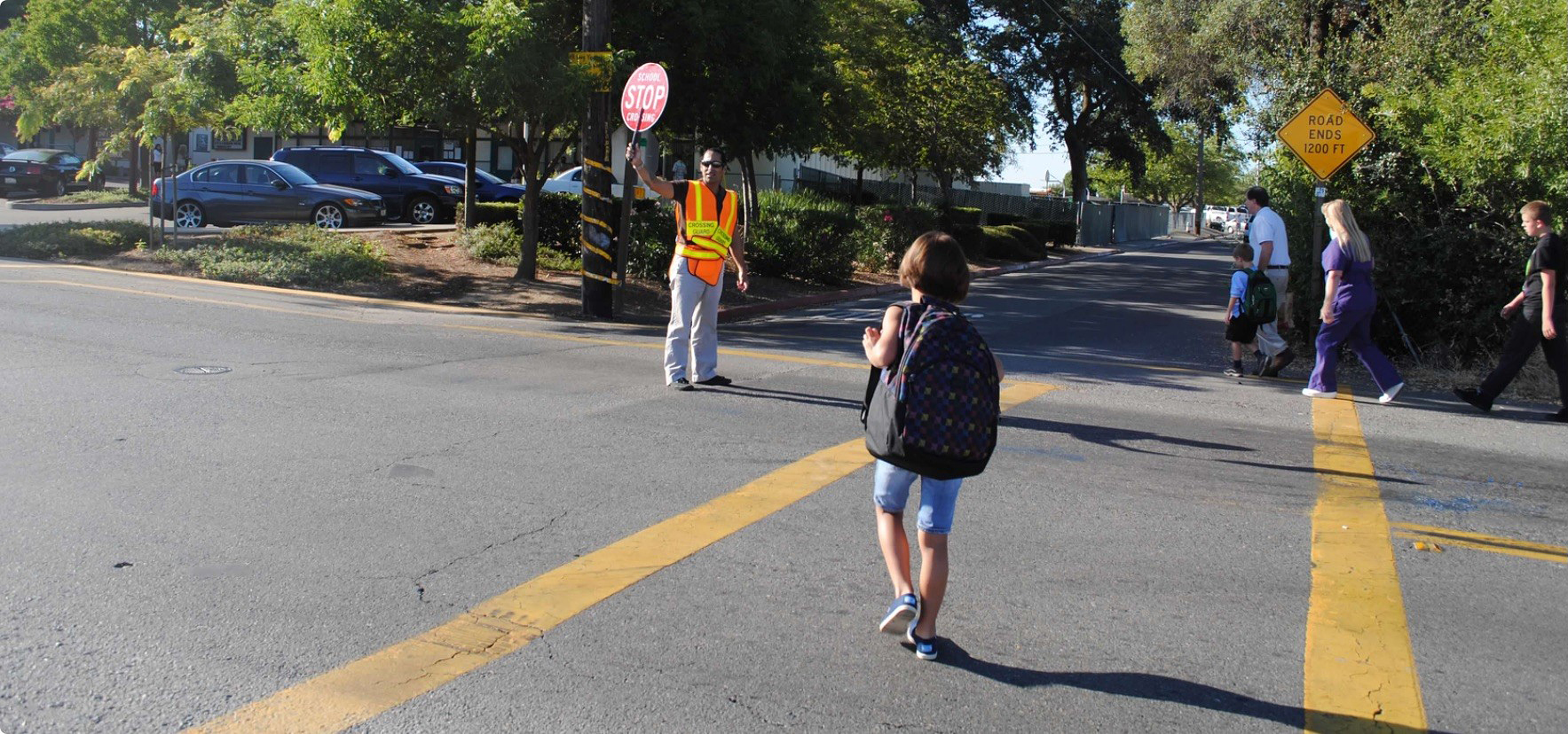 Patrick working as a crossing guard at Dry Creek Elementary School